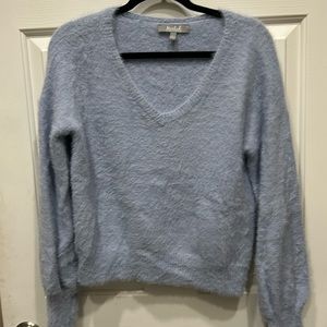 fuzzy blue sweater